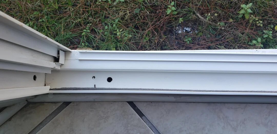 Close-up of a clean window sill and track ready for smooth operation
